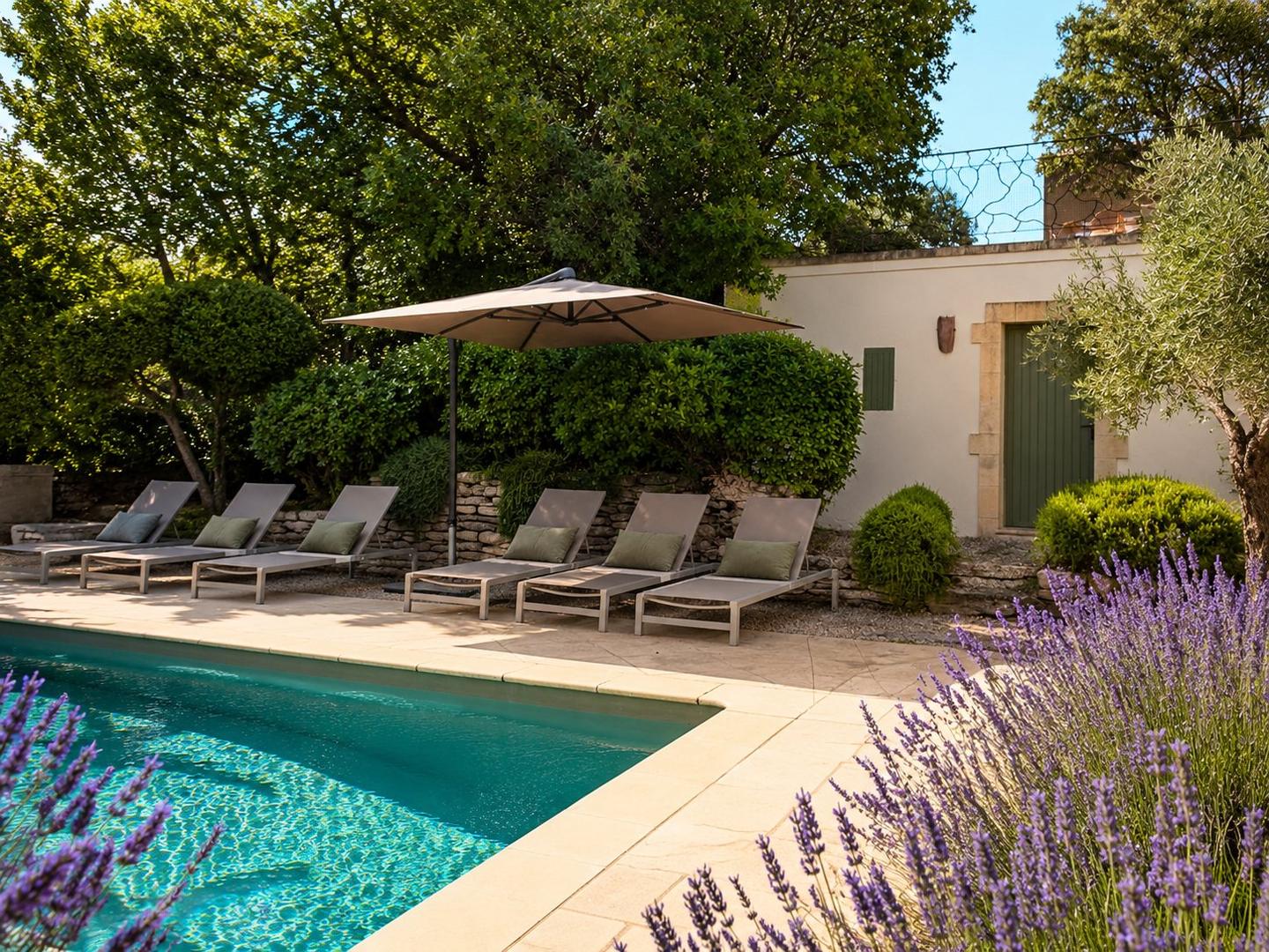 Sun loungers beside the private pool